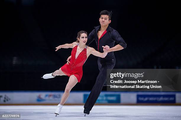 Marissa Castelli and Mervin Tran of the United States compete during Pairs Free Skating on day two of the Trophee de France ISU Grand Prix of Figure...