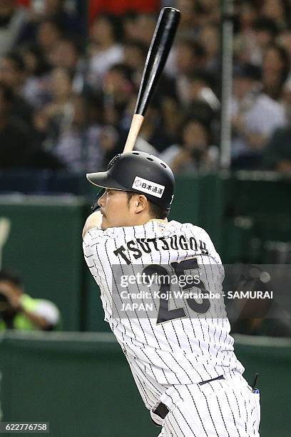 Yoshitomo Tsutsugoh of Japan hits a RBI double in the fifth inning during the international friendly match between Japan and Netherlands at the Tokyo...