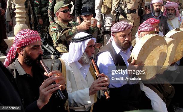 Iraqi Yezidis gather to perform their religious rituals after they return to their home following the operation to clear Bashiqa town as the...