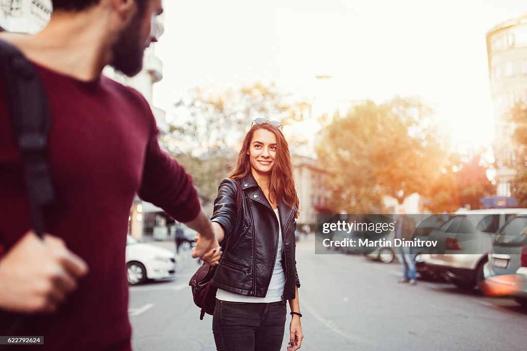 Happy couple dating outside