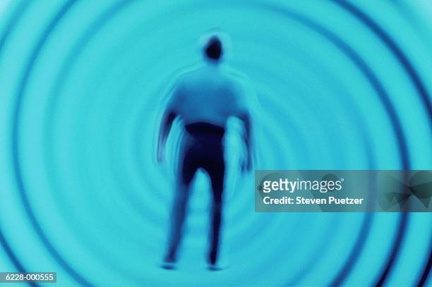 man in spiral - trippy stock pictures, royalty-free photos & images
