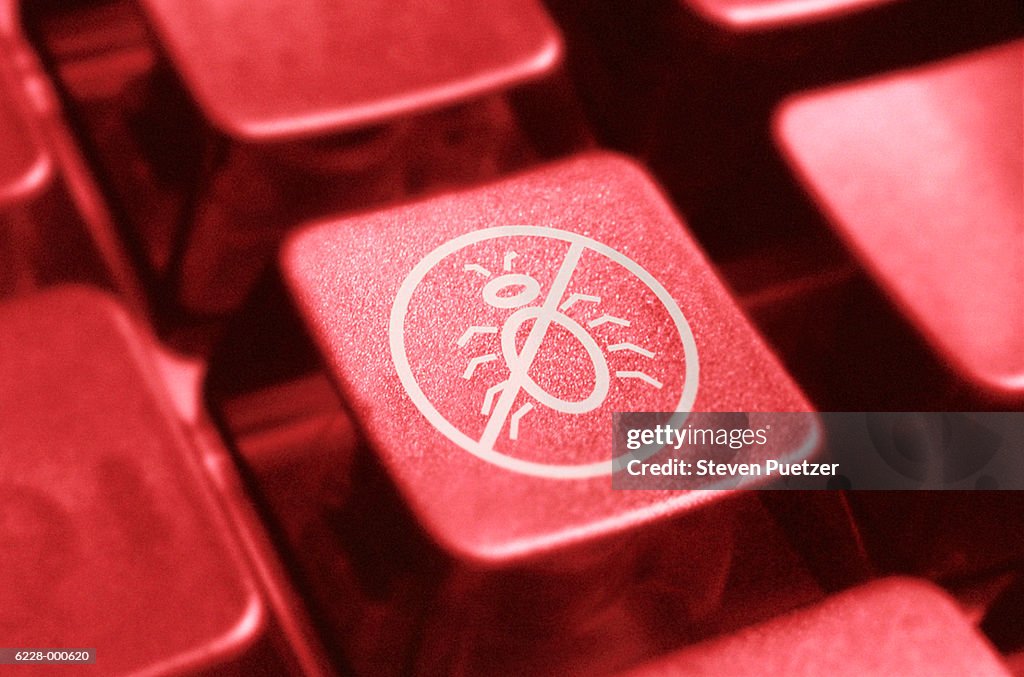 Computer key with icon showing red line through ?bug'