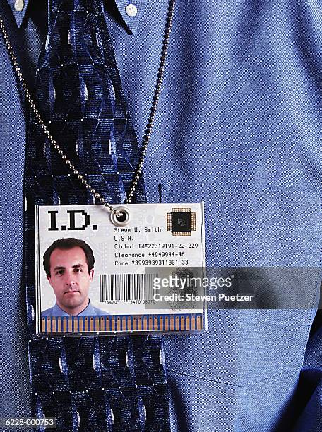 man in shirt with i.d. - id card photos et images de collection