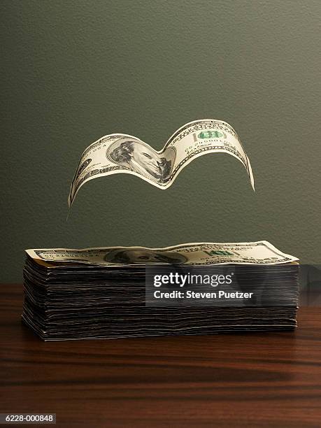 Floating Money Stack 2,121 Pile Of Money On Table Stock Photos, High-Res Pictures, and ...