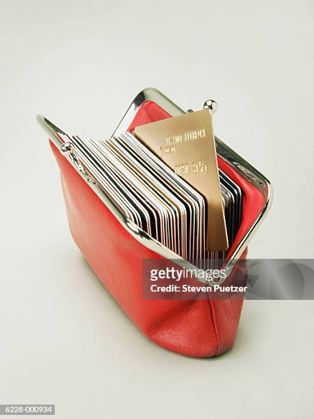 wallet full of bank card - credit card and stapel stockfoto's en -beelden