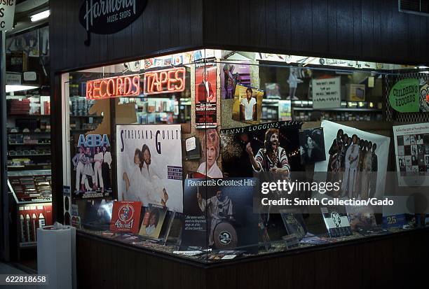 Window display at Harmony Music Shop, a record store in New York City, New York, possibly located in the Bronx, 1980. .