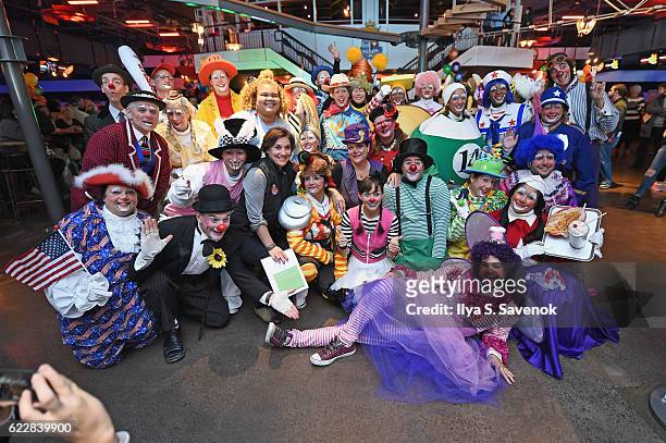 Group Vice President, Macy's Parade and Entertainment Group Amy Kule poses with a group of professional clowns as Macy's prepares for the 90th Macy's...