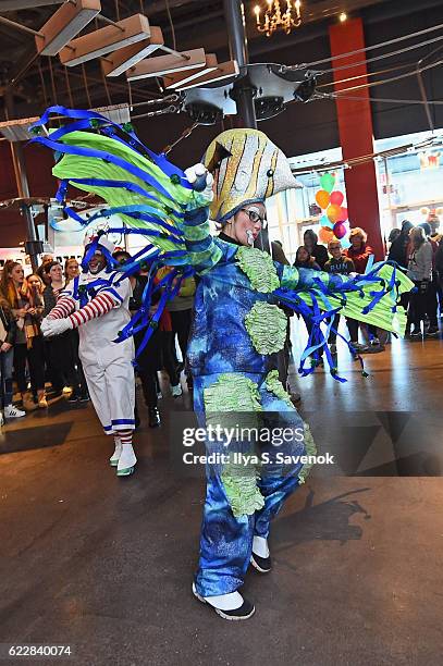 Professional clowns perform with volunteers as Macy's prepares for the 90th Macy's Thanksgiving Day Parade at Clown U. At Bowlmor Chelsea Piers on...
