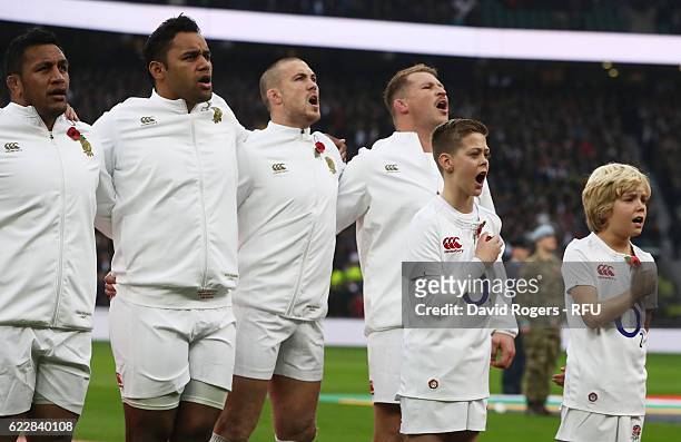 England players and matchday mascots sing the national anthem prior to the Old Mutual Wealth Series match between England and South Africa at...