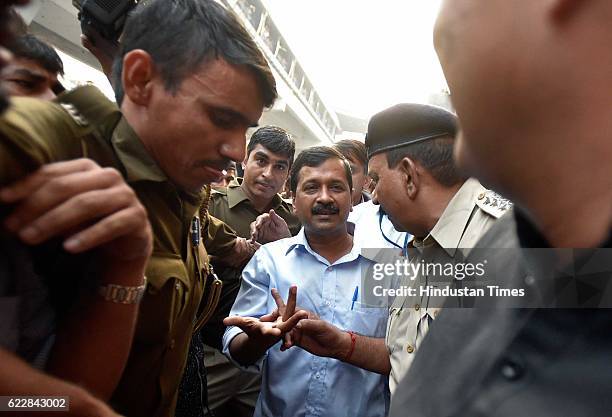 Delhi Chief Minister Arvind Kejriwal visits Lakshmi Nagar market to meet shopkeepers, on November 12, 2016 in New Delhi, India. Kejriwal kicked off a...