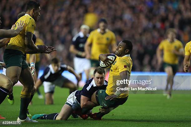 Stuart Hogg of Scotland tries to stopTevita Kuridrani of Australia as he runs through to score a try during the Scotland v Australia Autumn Test...