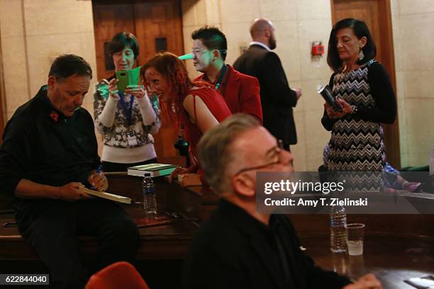 Actor Ian Buchanan who portrayed Dick Tremayne and actor Chris Mulkey who portrayed Hank Jennings on 'Twin Peaks' signs autographs during the Twin...