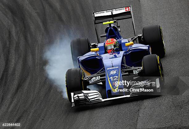 Felipe Nasr of Brazil driving the Sauber F1 Team Sauber C35 Ferrari 059/5 turbo locks a wheel under braking during qualifying for the Formula One...