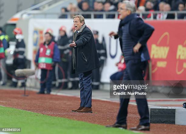 Romania's coach Christoph Daum and coach Adam Nawalka of Poland during the FIFA World Cup 2018 Qualifying Group E match between Romania and Poland at...