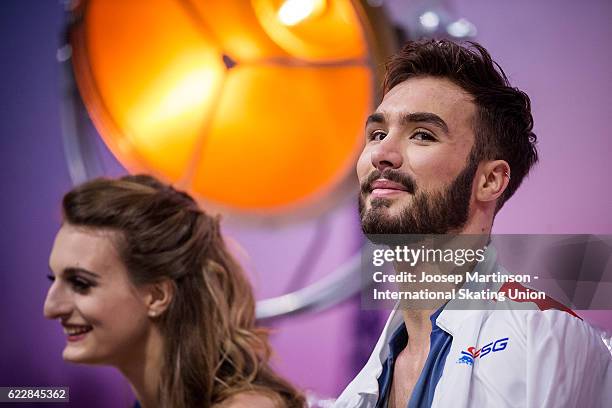 Gabriella Papadakis and Guillaume Cizeron of France look on at kiss and cry after competing in Ice Dance Free Dance on day two of the Trophee de...