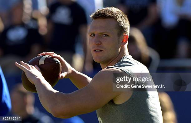 Quarterback Taysom Hill of the Brigham Young Cougars warms up prior to their game against the Southern Utah Thunderbirds at LaVell Edwards Stadium on...