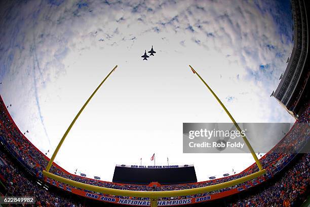 Two fighter jets perform a flyover before the game between the Florida Gators and the South Carolina Gamecocks at Ben Hill Griffin Stadium on...