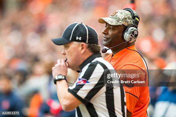 Head coach Dino Babers of the Syracuse Orange calls a timeout during the second quarter against the North Carolina State Wolfpack on November 12,...