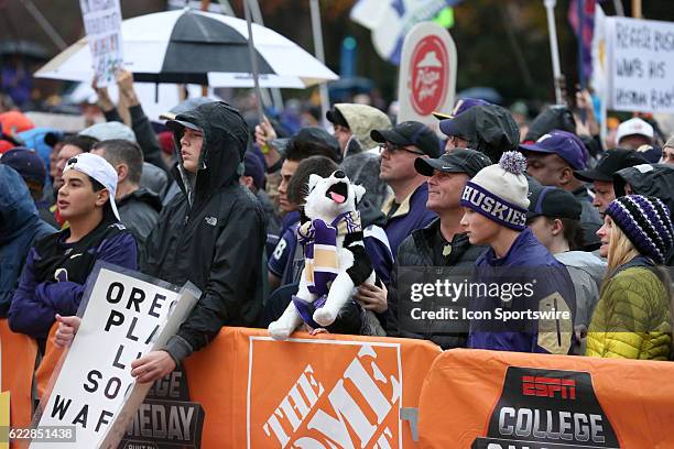 Fans weathered the cold and rain to be part of the ESPN College GameDay experience before game between Washington and USC on November 12 at the...