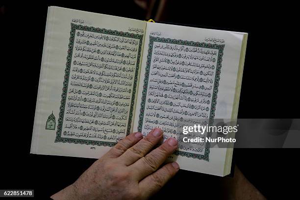 Ramdane Hadj-Idris, of Algerian origin, explains parts of Sourat Al-Waqi'a from the Koran book. A small mosque in Recife, northeastern Brazil,...