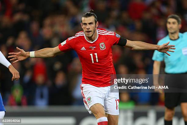 Gareth Bale of Wales celebrates after he scores to make it 1-0 during the FIFA 2018 World Cup Qualifier between Wales and Serbia at Cardiff City...