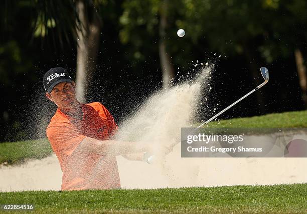 Webb Simpson of the United States hits to the seventh green from a greenside bunker during the third round of the OHL Classic at Mayakoba on November...