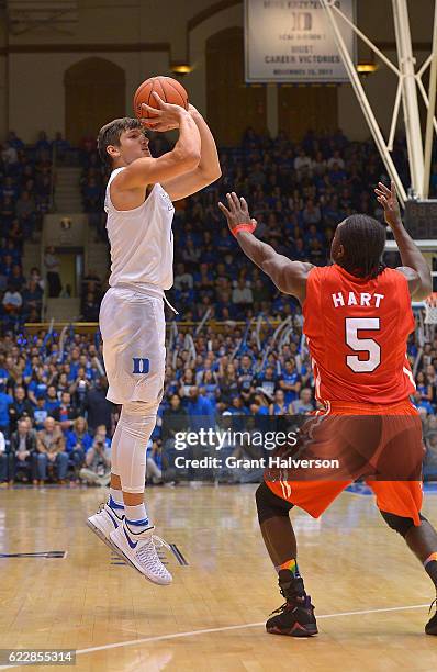 Grayson Allen of the Duke Blue Devils thakes a three-point shot against the Marist Red Foxes during the game at Cameron Indoor Stadium on November...