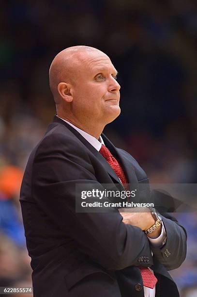 Head coach Mike Maker of the Marist Red Foxes watches his team play against the Duke Blue Devils during the game at Cameron Indoor Stadium on...