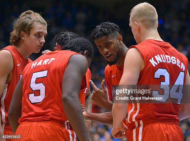 Kentrall Brooks of the Marist Red Foxes huddles with teammates during the game against the Duke Blue Devils at Cameron Indoor Stadium on November 11,...