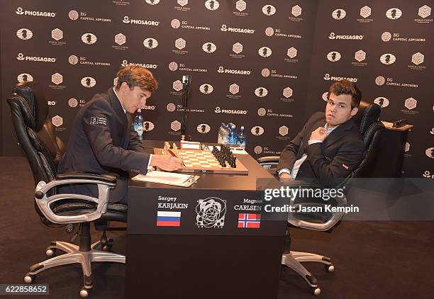 Reigning Chess Champion Magnus Carlsen and Chess grandmaster Sergey Karjakin during the game at 2016 World Chess Championship at Fulton Market...