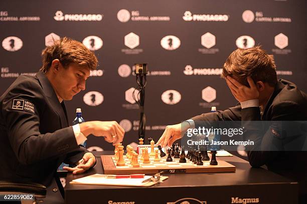 Reigning Chess Champion Magnus Carlsen and Chess grandmaster Sergey Karjakin during the game at 2016 World Chess Championship at Fulton Market...