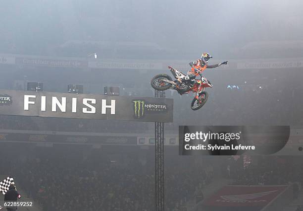 French KTM rider Marvin Musquin celebrates following his victory during the Supercross of Paris Lille SX1 final run on November 12, 2016 in Lille,...