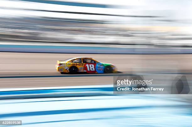 Kyle Busch, driver of the M&M's Toyota, practices for the NASCAR Sprint Cup Series Can-Am 500 at Phoenix International Raceway on November 12, 2016...