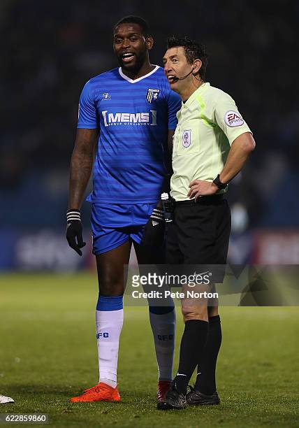 Jay Emmanuel-Thomas of Gillingham and referee Lee Probert look on during the Sky Bet League One match between Gillingham and Northampton Town at...