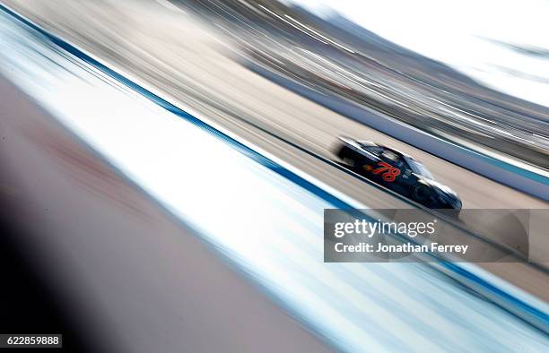 Martin Truex Jr., driver of the Furniture Row/Denver Mattress Toyota, practices for the NASCAR Sprint Cup Series Can-Am 500 at Phoenix International...