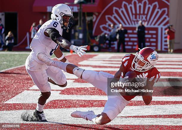 Nick Westbrook of the Indiana Hoosiers catches a touchdown pass in the end zone as Malik Golden of the Penn State Nittany Lions defends at Memorial...