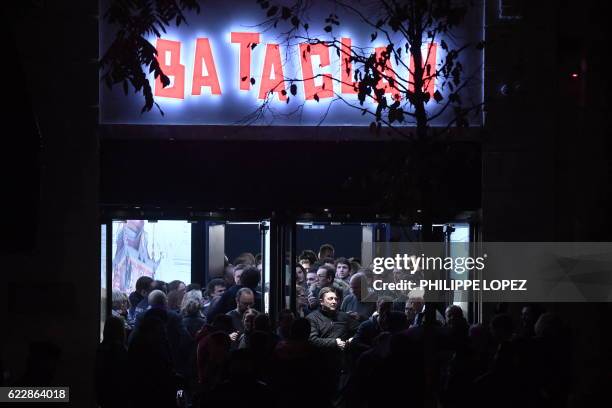 People leave the Bataclan concert hall in Paris on November 12 after the reopening concert by British musician Sting to mark the first anniversary of...