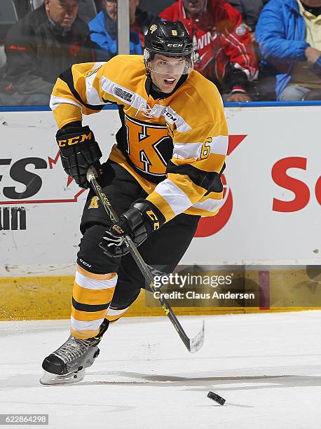 Jacob Paquette of the Kingston Frontenacs skates with the puck against the London Knights during an OHL game at Budweiser Gardens on November 11,...