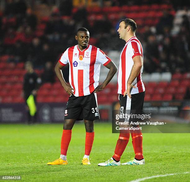 Lincoln Citys Theo Robinson and Lincoln City's Matt Rhead during the Vanarama National League match between Lincoln City and Aldershot at Sincil Bank...