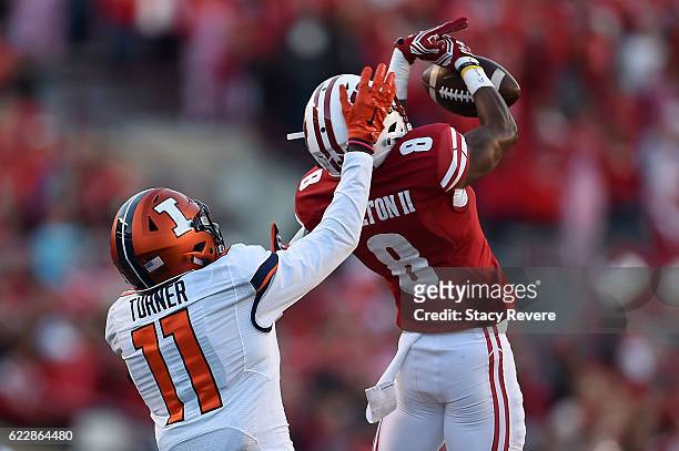 Sojourn Shelton of the Wisconsin Badgers defends a pass intended for Malik Turner of the Illinois Fighting Illini during the first half of a game at...