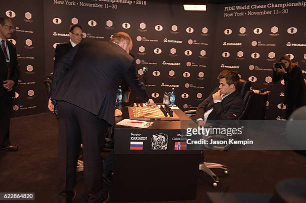 And Chairman of the Management Board, PHOSAGRO Andrey A. Guryev makes the first move for the game between Reigning Chess Champion Magnus Carlsen and...