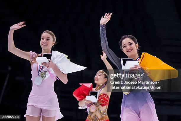 Maria Sotskova of Russia, Wakaba Higuchi of Japan, Evgenia Medvedeva of Russia celebrate after the Ladies Singles medal ceremony on day two of the...