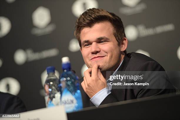 Reigning Chess Champion Magnus Carlsen speaks during the press conference after a draw at 2016 World Chess Championship at Fulton Market Building on...