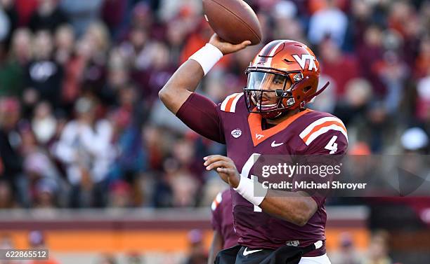 Quarterback Jerod Evans of the Virginia Tech Hokies throws against the Georgia Tech Yellow Jackets in the first half at Lane Stadium on November 12,...
