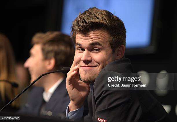 Reigning Chess Champion Magnus Carlsen speaks during the press conference after a draw at 2016 World Chess Championship at Fulton Market Building on...