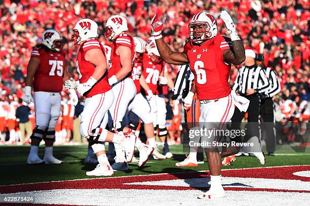 Corey Clement of the Wisconsin Badgers reacts to a touchdown during the first half of a game against the Illinois Fighting Illini at Camp Randall...