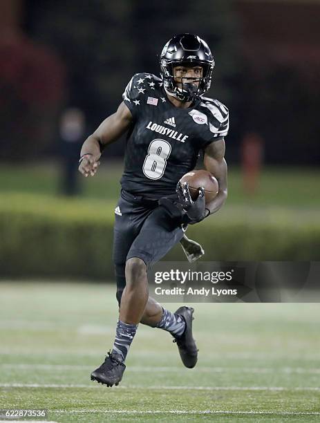 Lamar Jackson of the Louisville Cardinals runs with the ball during the game against the Wake Forest Deamon Deacons at Papa John's Cardinal Stadium...