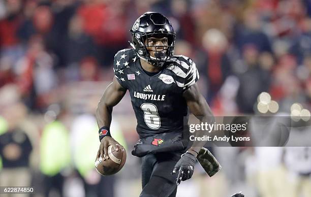 Lamar Jackson of the Louisville Cardinals runs with the ball during the game against the Wake Forest Deamon Deacons at Papa John's Cardinal Stadium...
