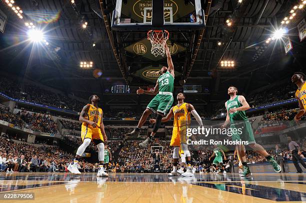 James Young of the Boston Celtics dunks the ball against the Indiana Pacers on November 12, 2016 at Bankers Life Fieldhouse in Indianapolis, Indiana....