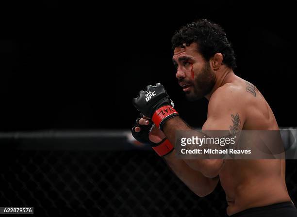 Rafael Natal of Brazil fights against Tim Boetsch of the United States in their middleweight bout during the UFC 205 event at Madison Square Garden...